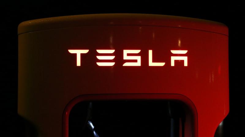 Tesla Halts Driving Assistance Software Trial in China, Pending Approval